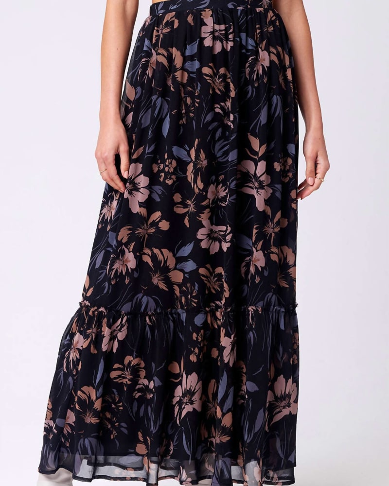 Front of a model wearing a size L Henlee Skirt in Black in Black by saltwater LUXE. | dia_product_style_image_id:343416